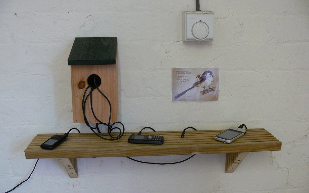 A charging shelf with several handsets plugged in at once.